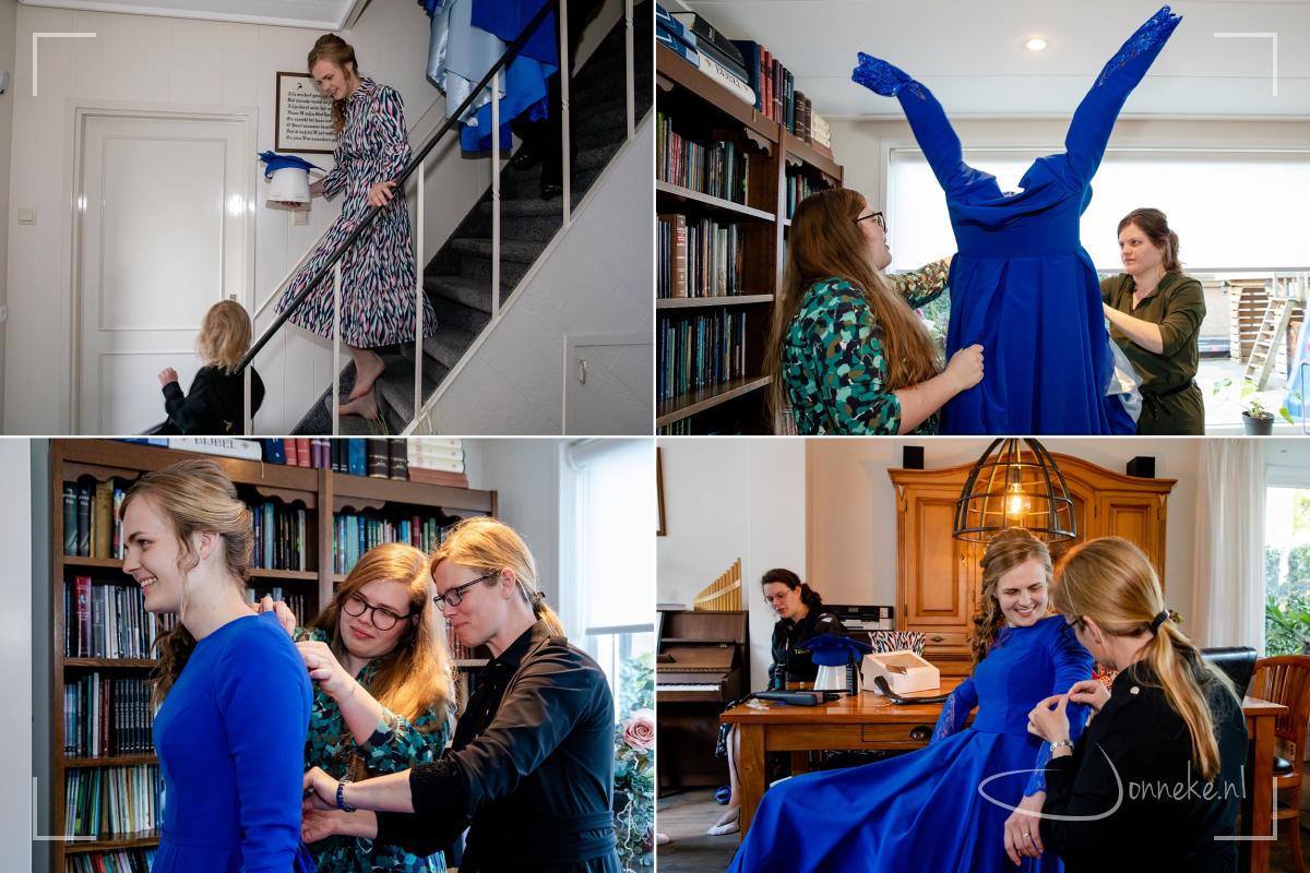 Dan mag je jurk eindelijk aan! Er was gelijk heel even wat te repareren, maar is de rest van de dag blijven zitten.